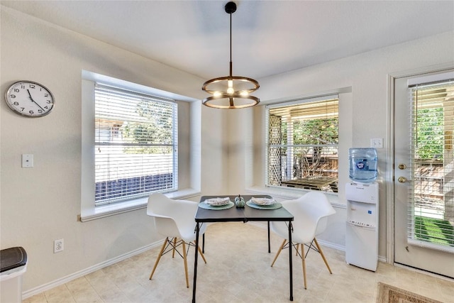 4316 Campo Verde Dr, Austin, TX 78749 - dining space featuring a chandelier and baseboards