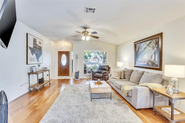 4316 Campo Verde Dr, Austin, TX 78749 - living area featuring a ceiling fan, light wood finished floors, vaulted ceiling, and baseboards