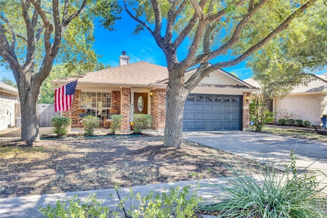 view of front of home with a garage and covered porch