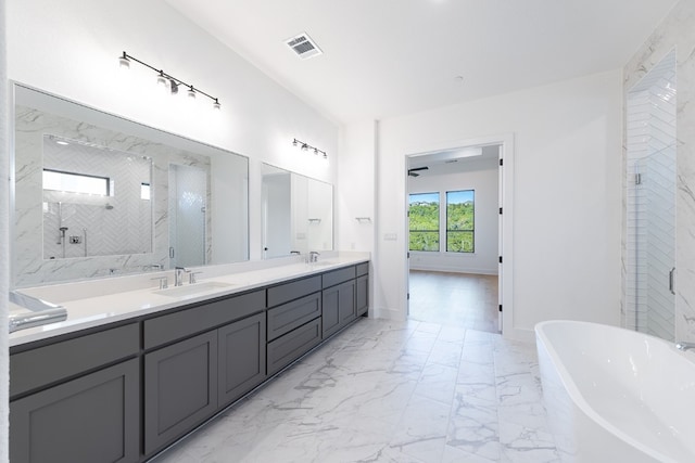 bathroom featuring independent shower and bath and vanity