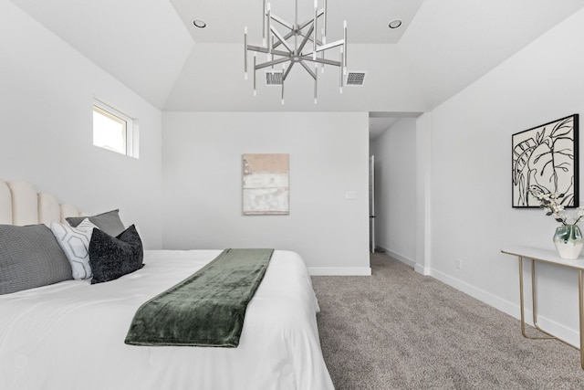 bedroom featuring lofted ceiling, a chandelier, and carpet