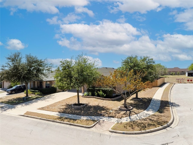 view of property hidden behind natural elements