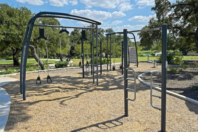 view of property's community with a playground