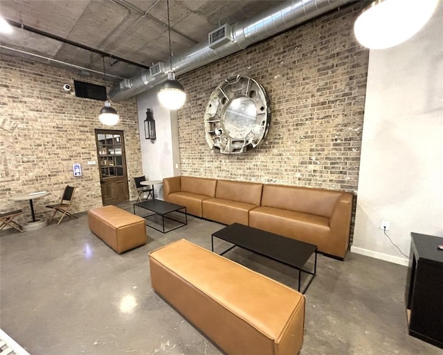 4510 Terry-O Ln Unit 406, Austin, TX 78745 - community lobby featuring a towering ceiling and brick wall
