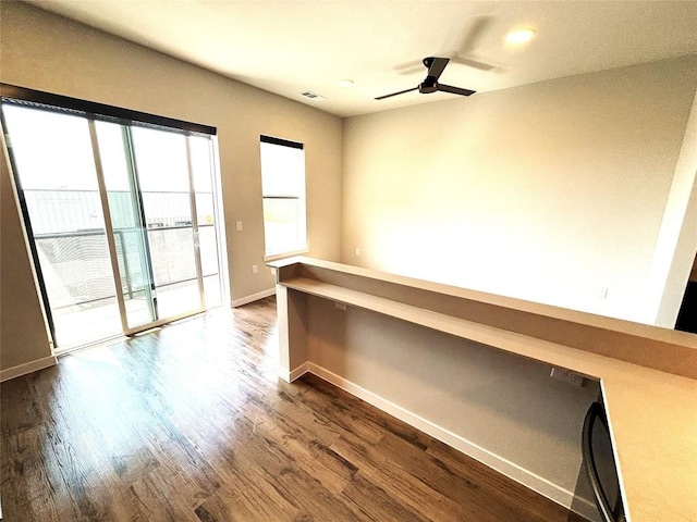 4510 Terry-O Ln Unit 406, Austin, TX 78745 - empty room with healthy amount of natural light, dark wood-type flooring, a ceiling fan, and recessed lighting