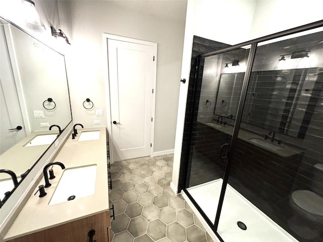 4510 Terry-O Ln Unit 406, Austin, TX 78745 - full bath with tile patterned floors, a stall shower, double vanity, and baseboards
