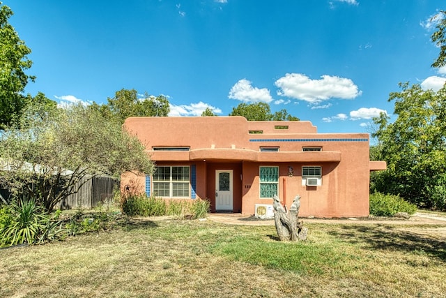 view of front of house with a front lawn