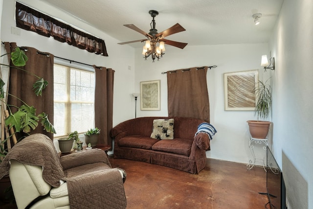 living room featuring lofted ceiling, a textured ceiling, and ceiling fan