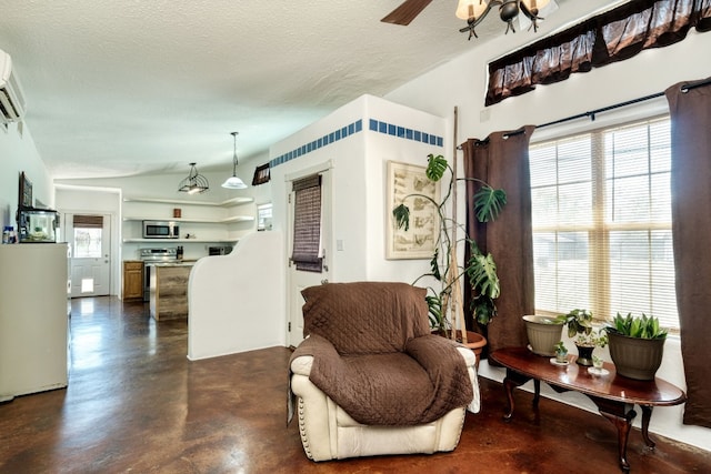 living area featuring a textured ceiling and lofted ceiling