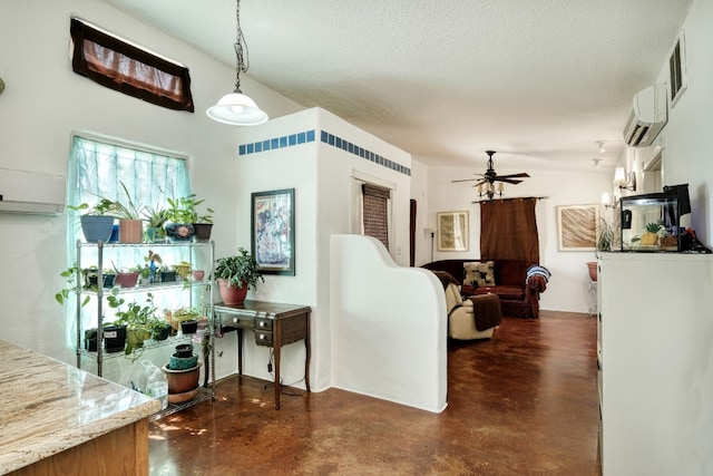 living room with a textured ceiling, lofted ceiling, ceiling fan, and a wall unit AC