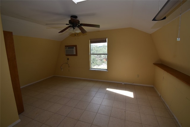 spare room featuring ceiling fan, lofted ceiling, and a wall mounted AC