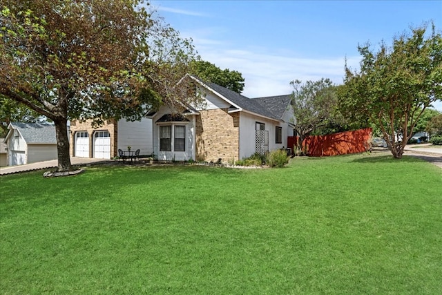 view of yard with a garage