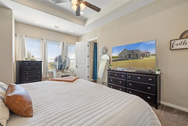 bedroom with ceiling fan and carpet floors