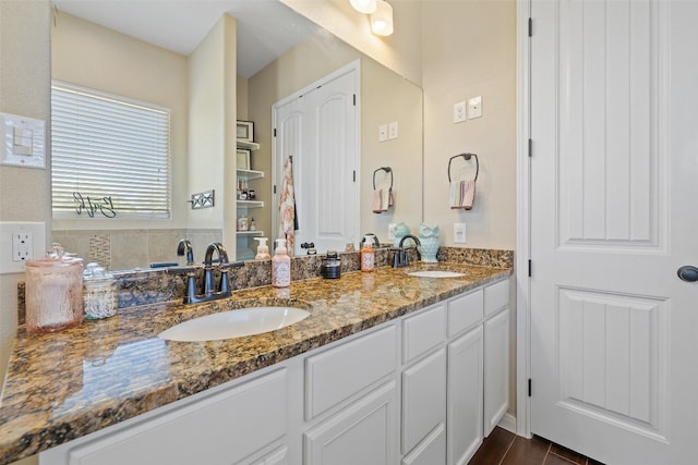 bathroom with vanity and hardwood / wood-style floors