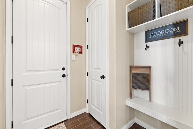 mudroom featuring dark wood-type flooring