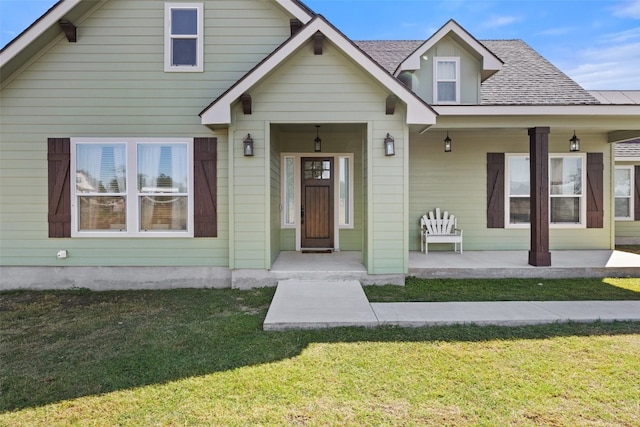 bungalow with a front lawn