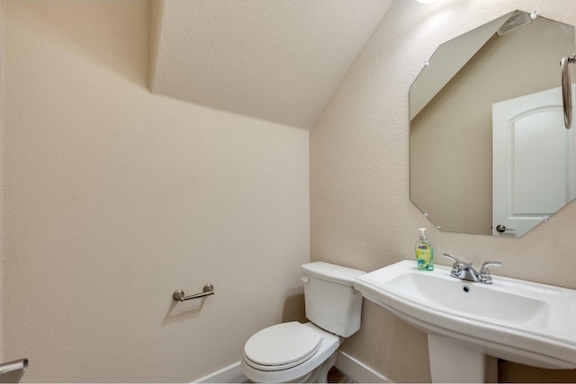 bathroom with sink and toilet