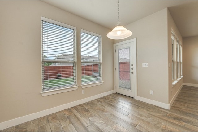 entrance foyer featuring hardwood / wood-style flooring