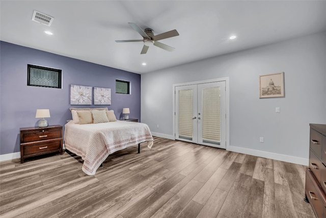 bedroom with ceiling fan, french doors, light hardwood / wood-style floors, and access to outside