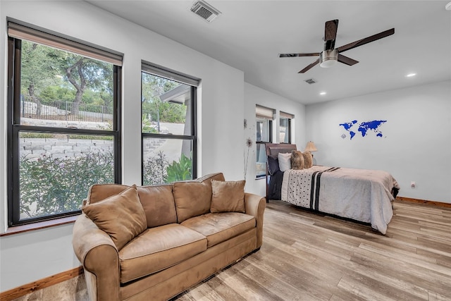 bedroom featuring ceiling fan and light wood-type flooring