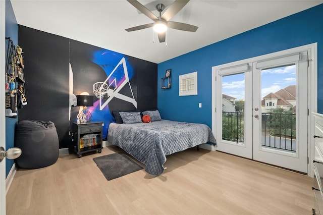 bedroom with access to outside, french doors, light hardwood / wood-style floors, and ceiling fan