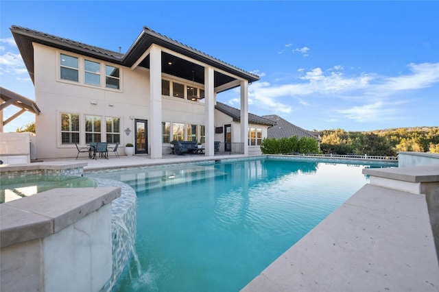 view of pool featuring a patio area