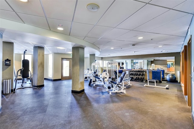 gym featuring a drop ceiling