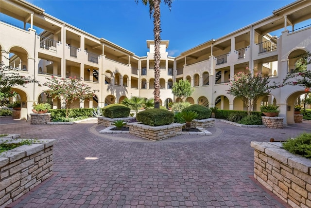 surrounding community with a patio area