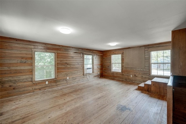 921 E 51st St Unit 1, Austin, TX 78751 - empty room with wood-type flooring, wood walls, and cooling unit