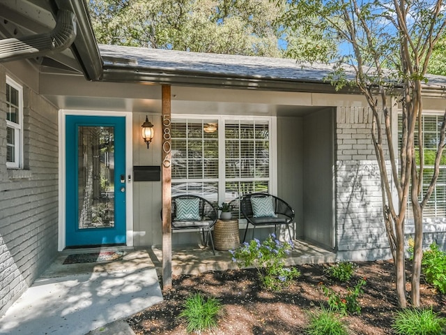 entrance to property with a porch