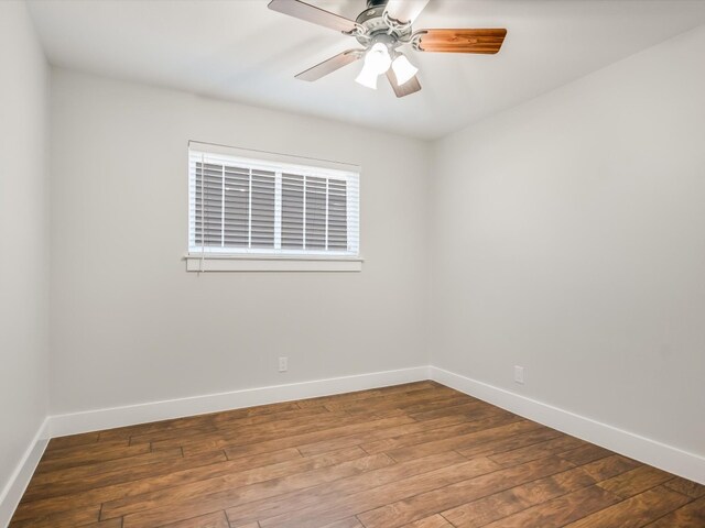 empty room featuring wood-type flooring and ceiling fan