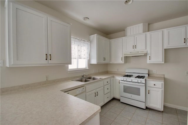 kitchen featuring white cabinets, white appliances, light tile patterned floors, and sink