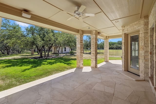 view of patio featuring ceiling fan