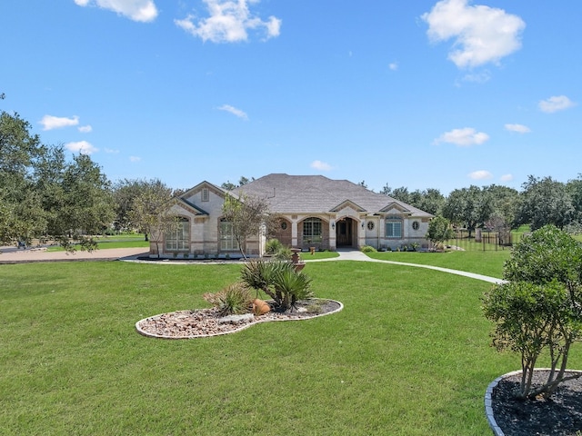 view of front of house featuring a front lawn and a swimming pool