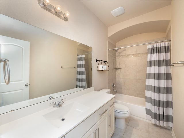 full bathroom featuring shower / tub combo, vanity, toilet, and tile patterned floors