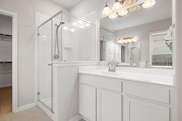 bathroom with vanity, tile patterned floors, and an enclosed shower