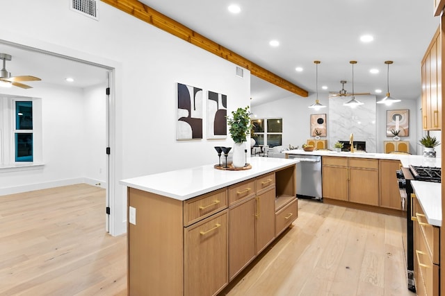 kitchen featuring a kitchen island, light hardwood / wood-style flooring, lofted ceiling with beams, decorative light fixtures, and appliances with stainless steel finishes