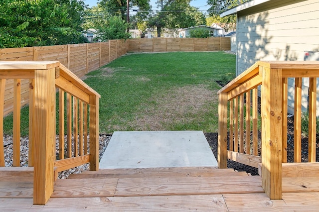 view of yard with a wooden deck