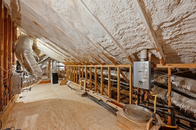 attic featuring water heater