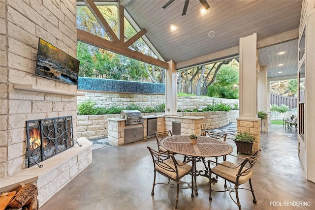 view of patio / terrace featuring area for grilling, ceiling fan, a grill, an outdoor stone fireplace, and outdoor dining space