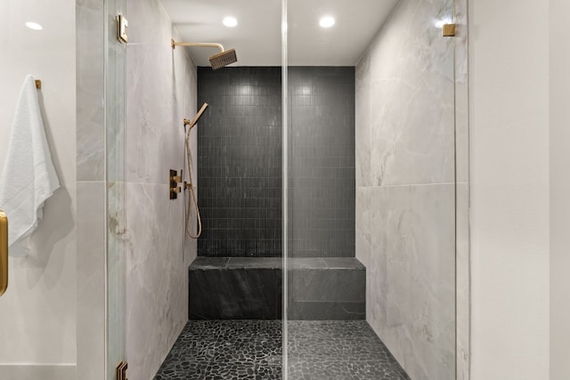 bathroom featuring an enclosed shower