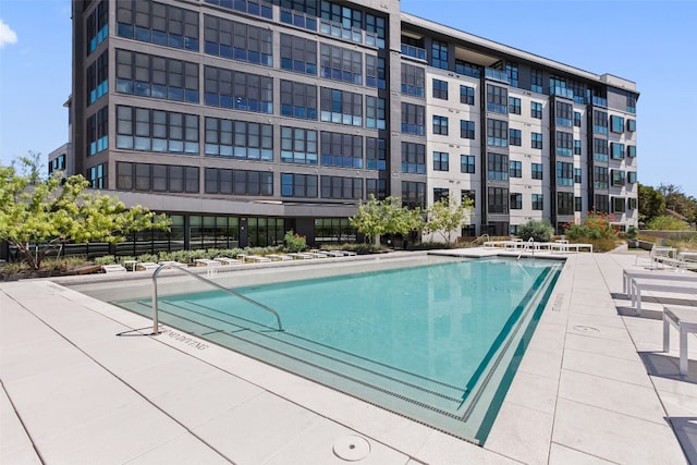 view of pool featuring a patio