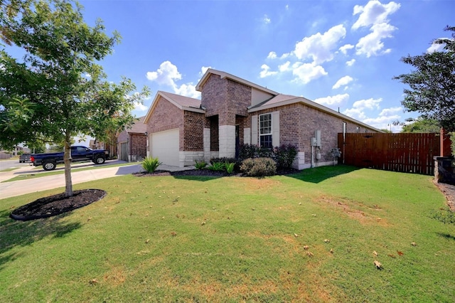 view of front of house featuring a garage and a front yard