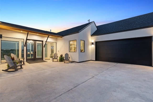 exterior space with a garage