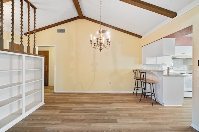 dining area featuring high vaulted ceiling, light wood-type flooring, a chandelier, and beamed ceiling