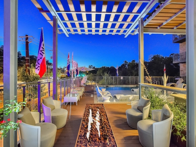 view of patio / terrace featuring a pergola and a swimming pool