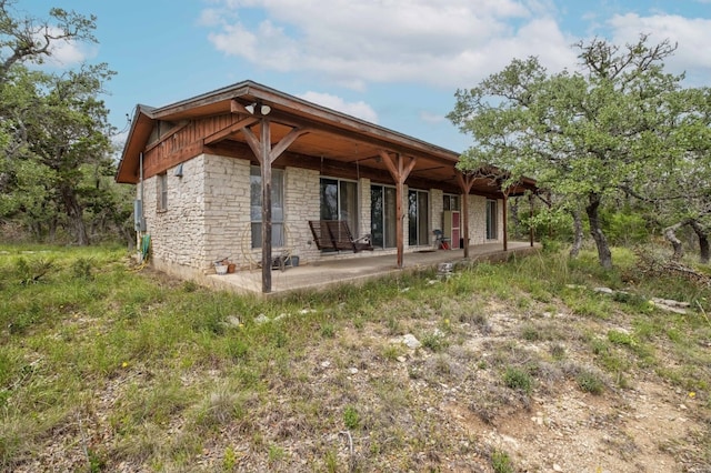 back of house featuring a patio