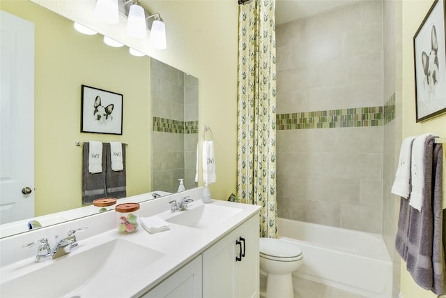 full bathroom with shower / bath combo with shower curtain, vanity, and toilet