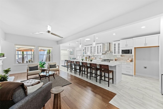 living room featuring ceiling fan