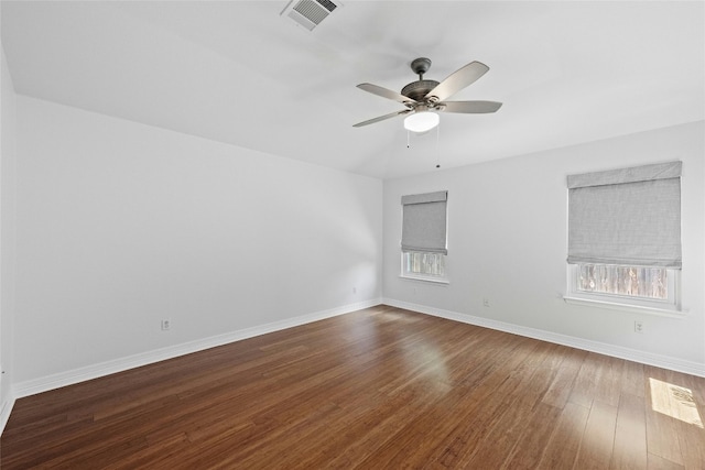 unfurnished room with ceiling fan and hardwood / wood-style flooring